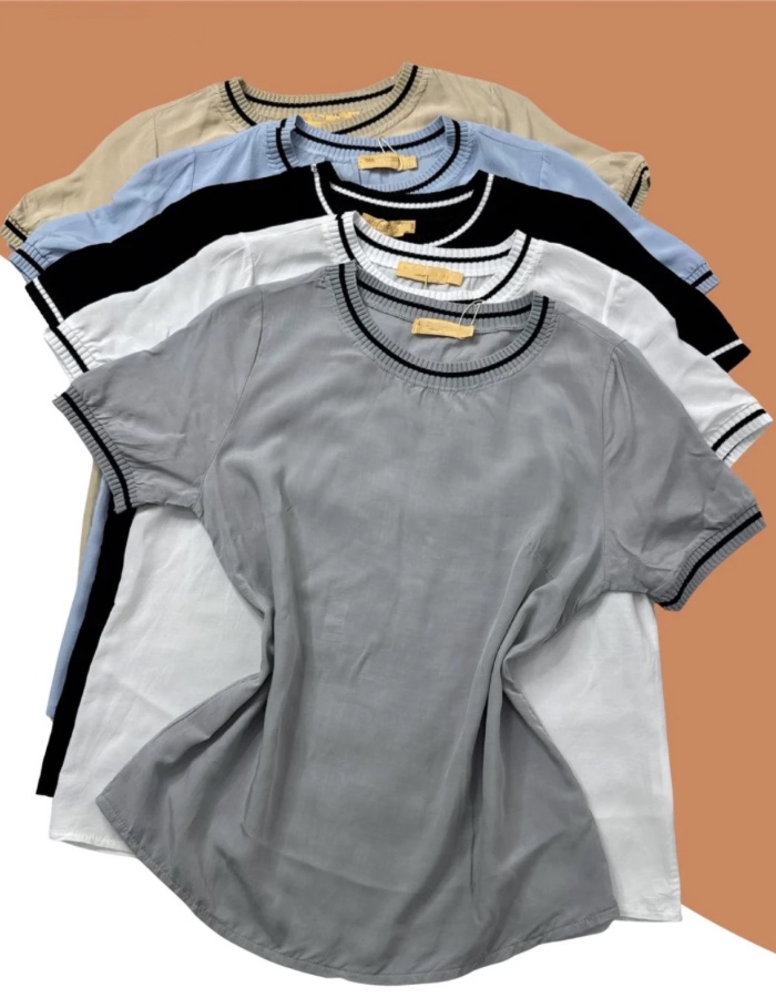 Blusa com detalhes na gola e na manga 